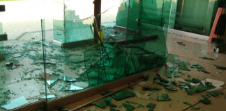 Habitantes de Teopoxco realizan destrozos en Ciudad Administrativa