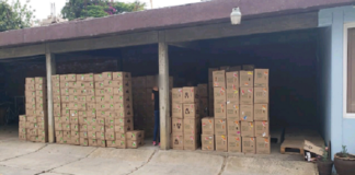 En San Lorenzo Cacaotepec, Fiscalía General coordina y ejecuta cateo; en dos días asegura más de mil cajas de mercancía con reporte de robo