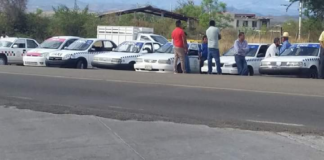 Materialistas del FNIC bloquean carretera por disputa de obra