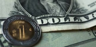 Peso vuelve a rebasar las 20 unidades por dólar