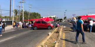 Con bloqueos carreteros en el Istmo, empleados exigen vacuna anticovid