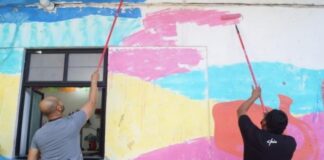 Con mural, artistas de Oaxaca y de la frontera visibilizan situación de oaxaqueños migrantes