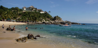 Puerto Escondido en Semáforo Rojo; anuncian multa por no usar cubrebocas