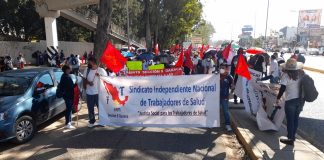 Marcha sol rojo para demandar recursos y justicia .