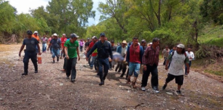 Localizan a padre e hijo sin vida arrastrados por Río en Ayuquila