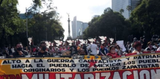 Marchan indígenas y estudiantes contra militarización