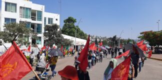 Protesta “Sol Rojo” para exigir aparición de activista